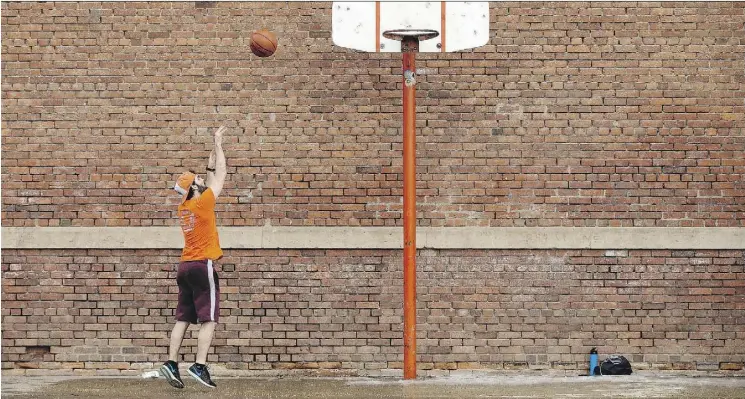  ?? DAVID BLOOM ?? NET GAIN Gregoire Bongrand shoots some hoops at Garneau School on Saturday.