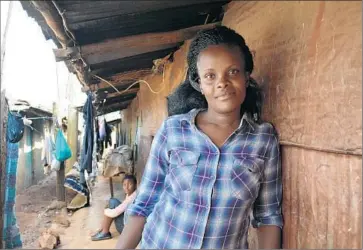  ?? Robyn Dixon
Los Angeles Times ?? LILIAN MASILA’S hair salon in Nairobi’s Kibera slum was among the businesses torn down to widen a road. There is no hope of compensati­on or relocation because the squatters are on Kenyan government land.