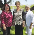  ??  ?? LEFT: The original “Pete the Pelican” book. RIGHT: Yasmin John-Thorpe (far right) of Penticton is pictured with her partners Nikole Haumont (left) and Cheryl Anthony.