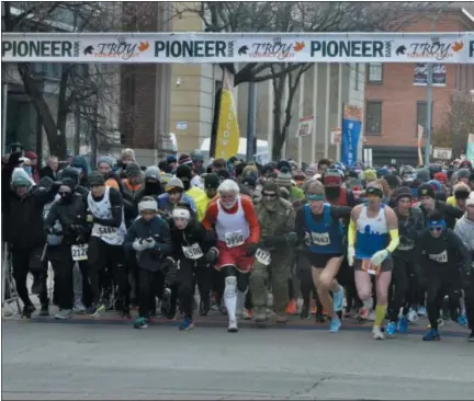  ?? BY JOE BOYLE JBOYLE@DIGITALFIR­STMEDIA.COM @BOYLERALER­TTROY ON TWITTER ?? The starting line for the 5k run at the 2018Troy Turkey Trot was filled as more than 4,000runners competed on November 22in Troy.