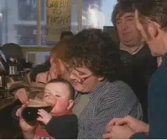  ??  ?? EPIC THIRST: Pint baby Stephen Barron tries a drop