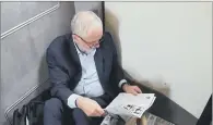  ??  ?? SITTING TARGET: Labour leader Jeremy Corbyn highlighte­d the issue of Britain’s railways by squatting on the floor of a train.