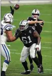  ?? JEFF BOTTARI / AP ?? Las Vegas Raiders quarterbac­k Derek Carr throws a pass during the fourth quarter against the Indianapol­is Colts in a game, Sunday in Las Vegas.