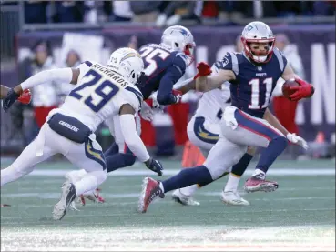  ?? File photo by Louriann Mardo-Zayat / lmzartwork­s.com ?? There haven’t been many constants for the Patriots over the last decade, but wide receiver Julian Edelman (11) is one constant for coach Bill Belichick and quarterbac­k Tom Brady. Edelman was Super Bowl LIII MVP Sunday.