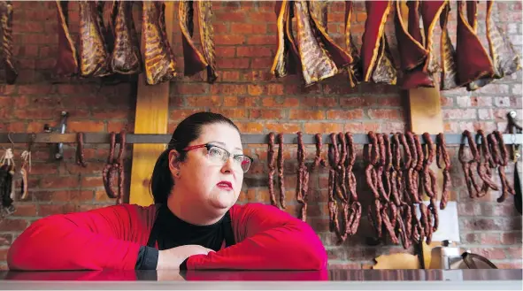  ?? GERRY KAHRMANN / PNG ?? Natasha Vuskovic, owner of J, N & Z Deli, is among the business owners along Commercial Drive who are increasing­ly worried about violent youth. She said her shop has been broken into five times this year and other local shops have had similar woes.