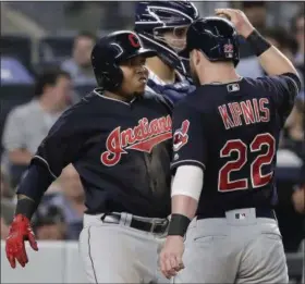  ?? JULIE JACOBSON — THE ASSOCIATED PRESS ?? The Indians’ Jose Ramirez, left, celebrates with Jason Kipnis after hitting a two-run home run against the Yankees during the eighth inning,