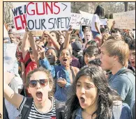  ??  ?? AND THE CHILDREN SHALL LEAD: Highschool­ers protest Wednesday in Tallahasse­e, Fla.