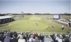  ??  ?? 0 Fans pack the 18th hole stands at the 2019 Scottish Open.