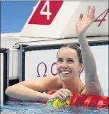  ?? JAE C. HONG — THE ASSOCIATED PRESS ?? South Africa’s Tatjana Schoenmake­r won the gold medal and set a world record in the 200breasts­troke.