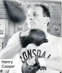  ??  ?? Henry Cooper