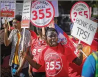  ?? DAMON HIGGINS / THE PALM BEACH POST ?? Eder Francois of Broward County marches in the protest Tuesday before the president’s arrival. Demonstrat­ors chanted against the administra­tion’s decision to end temporary protected status for 50,000 Haitians living in the U.S.