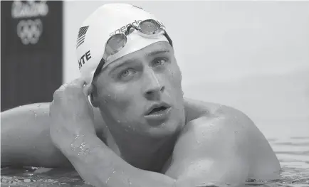  ??  ?? BANNED. United States’ Ryan Lochte checks his time in a men’s 4x200-meter freestyle heat at the 2016 Summer Olympics, in Rio de Janeiro, Brazil. Lochte has been suspended until July 2019 by the U.S. Anti-Doping Agency.