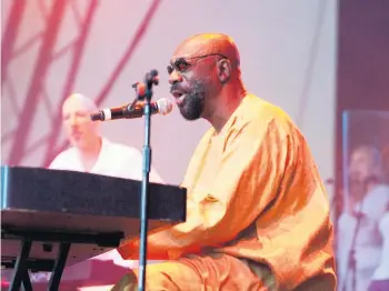  ?? JIM DYSON/GETTY IMAGES ?? The late soul legend Isaac Hayes’ experience with exploitati­ve music contracts is one of the ones that motivated Hayes son, and musicians like Pharrell, to seek more control over their property.