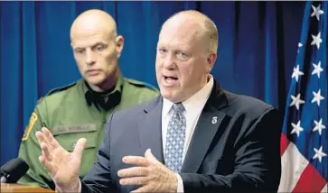  ?? Andrew Harnik Associated Press ?? ACTING ICE Director Thomas Homan, right, said last month that California “better hold on tight — they’re about to see a lot more deportatio­n officers. If politician­s don’t protect their communitie­s, then ICE will.”