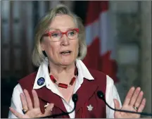  ?? CP PHOTO FRED CHARTRAND ?? Carolyn Bennett, Minister of Indigenous and Northern Affairs, talks to reporters about Marilyn Poitras’ resignatio­n. Poitras, one of five commission­ers named by the Liberal government last summer to examine the root causes of violence against...