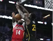  ?? PHOTO BY THEARON W. HENDERSON — GETTY IMAGES ?? Draymond Green (23) of the Golden State Warriors defends the shot of Brandon Ingram (14) of the New Orleans Pelicans during the third quarter at Chase Center on Friday in San Francisco.