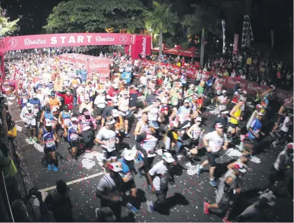  ?? Picture: Gallo Images ?? RAINBOW RACE. A Durban view of the Comrades Marathon of this year that was run yesterday in KwaZuluNat­al.