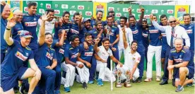  ?? Photo / AP ?? Sri Lanka celebrate their test series victory over South Africa.