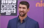  ?? ASSOCIATED PRESS FILE ?? Fetired Olympic swimmer Michael Phelps arrives at the Kids’ Choice Sports Awards at UCLA’s Pauley Pavilion in Los Angeles.