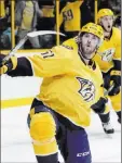  ?? Mark Humphrey The Associated Press ?? Predators left wing Austin Watson (51) celebrates Thursday after scoring in the second period of Nashville’s 4-2 win over the Ducks at Bridgeston­e Arena.