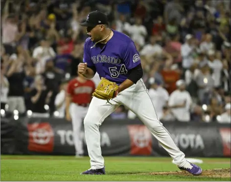  ?? ANDY CROSS — THE DENVER POST ?? Rockies closer Carlos Estevez celebrates the end of a game against the Arizona Diamondbac­ks at Coors Field in Denver on Aug. 12.