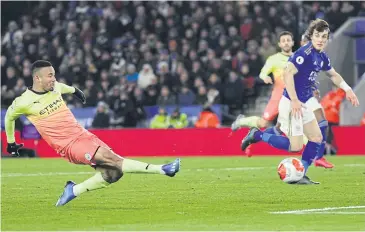  ?? REUTERS ?? Manchester City’s Gabriel Jesus scores against Leicester City.