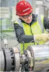  ?? Pictures: Kris Miller. ?? Top: An overview of Oceaneerin­g’s facility at the Port of Rosyth. Above: One of the firm’s Fife workers.