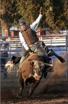  ?? NEWS-SENTINEL FILE PHOTOGRAPH ?? Troy Jensen rides his bull, Danger Zone, at the Clements Stampede rodeo in 2007. After a long hiatus, the stampede will return this Friday.
