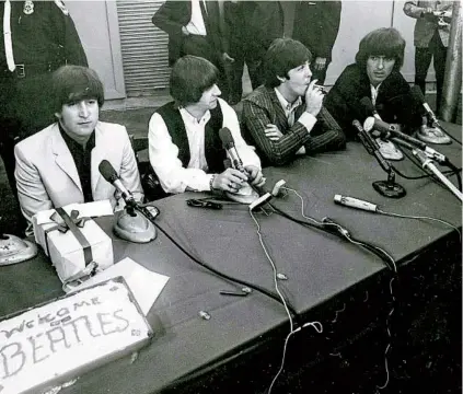  ?? CHUCK BOYD ?? The Beatles speak to the media at Balboa Stadium before their brief but memorable concert on Aug. 28, 1965.