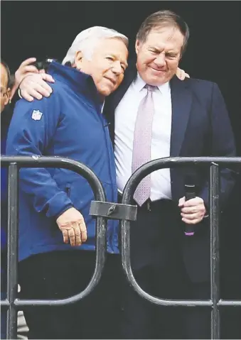  ?? MADDIE MEYER/GETTY IMAGES FILES ?? Owner Robert Kraft, left, and head coach Bill Belichick were pretty cosy just before the New England Patriots left town for a Super Bowl showdown with Seattle Seahawks in January 2015. However, Kraft indicated this week that he holds Belichick responsibl­e for quarterbac­k Tom Brady’s departure.