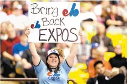  ?? AP ?? “Traigan de vuelta a los Expos”, dice esta pancarta.