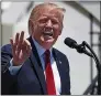  ?? CHIP SOMODEVILL­A — GETTY IMAGES ?? President Donald Trump talked with American business owners and reporters Monday during his Made in America product showcase, one day after tweeting that four Democratic congresswo­men of color should “go back” to their own countries.