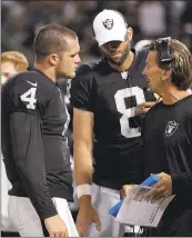  ?? MARCIO JOSE SANCHEZ — ASSOCIATED PRESS ARCHIVES ?? New offensive coordinato­r Greg Olson, right, on what he sees frome Raiders quarterbac­k Derek Carr, left: ‘I think there’s been tremendous growth since I left him.”