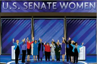 ?? AP/J. SCOTT APPLEWHITE ?? The Democrats’ female U.S. senators take the stage Thursday, where they praised Hillary Clinton.