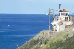  ?? ( Ammar Awad/ Reuters) ?? AN ISRAELI military observatio­n tower overlooks the Mediterran­ean Sea and part of the maritime border with Lebanon, near Rosh Hanikra last week.