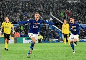 ??  ?? Leicester’s Jamie Vardy celebrates his goal against Arsenal to become the top scorer in the English Premier League season.