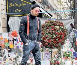  ??  ?? A somber return: Eagles of Death Metal frontman Jesse Hughes at the Bataclan theater in Paris, where the band was playing when terrorists struck.