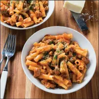  ?? Daniel J. van Ackere/America’s Test Kitchen via AP ?? Ziti with Fennel and Italian Sausage, from the cookbook “AllTime Best Sunday Suppers.”