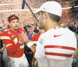  ??  ?? Garoppolo greets Patrick Mahomes after the Kansas City quarterbac­k led his team to three touchdowns in the game’s final 6½ minutes.