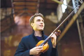  ??  ?? Violinist Alexi Kenney will perform with the Santa Fe Symphony.