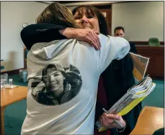  ?? (File Photo/AP/Pool/The Burlington Free Press/Ryan Mercer) ?? Chittenden County Deputy State’s Attorney Susan Hardin embraces on May 22, 2019, Elizabeth Harris, mother of Mary Harris, who was killed along with four other teens in 2016 when Steven Bourgoin collided with her car, after a jury pronounced Bourgoin guilty at Vermont Superior Court in Burlington, Vt. The jury found Bourgoin guilty of murder charges in the teenagers’ deaths, caused when he drove the wrong way on an interstate highway.