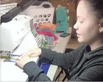  ?? Contribute­d, File ?? Johanna Moss sews a mask in this April 2020 file photo.