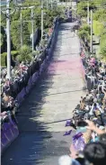  ?? PHOTO: LINDA ROBERTSON ?? What else could we tumble down Dunedin’s Baldwin St now Cadbury has rolled out of town? These pink Jaffas featured in the 2015 race.