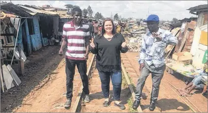  ?? SUBMITTED PHOTO ?? Stacey Baldwin of Victoria has been supporting the Makina Community Developmen­t Project’s children’s home in Kibera, Kenya since 2006. She is currently making her first visit to the area.