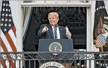  ?? SAMUEL CORUM/GETTY ?? President Donald Trump addresses supporters Saturday at the White House in his first public event since his hospitaliz­ation for COVID-19.