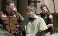  ?? ERIC YOUNG/HERALD-TIMES REPORTER VIA AP, FILE ?? In a 2006 file photo, Brendan Dassey, centre, is led out of the Manitowoc County Courthouse following his motion hearing in Manitowoc, Wis. A three-judge panel from the 7th Circuit on Thursday affirmed that Dassey, a Wisconsin inmate featured in the...