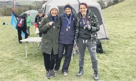  ?? ?? Haywards Heath Harriers Gemma Morgan, Emma Singer and Carys Hind took gold in the Sussex Masters