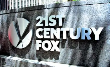  ?? AP PHOTO BY MARK LENNIHAN ?? Comcast said it’s dropping out of the bidding war for 21st Century Fox’s entertainm­ent business, instead focusing on its bid for Sky.