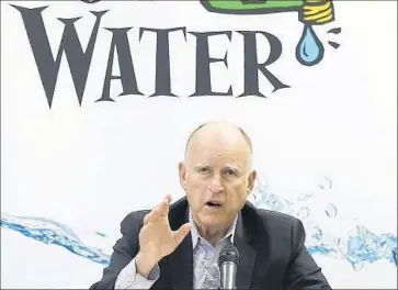  ?? Rich Pedroncell­i
Associated Press ?? A RECENT
poll shows widespread support for Gov. Jerry Brown’s order to cut water consumptio­n.