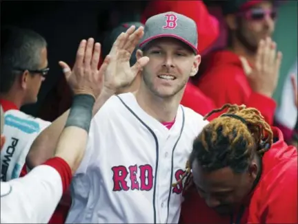  ?? MICHAEL DWYER — THE ASSOCIATED PRESS ?? Chris Sale celebrates in the dug out after being lifted from the game after the seventh inning on Saturday.